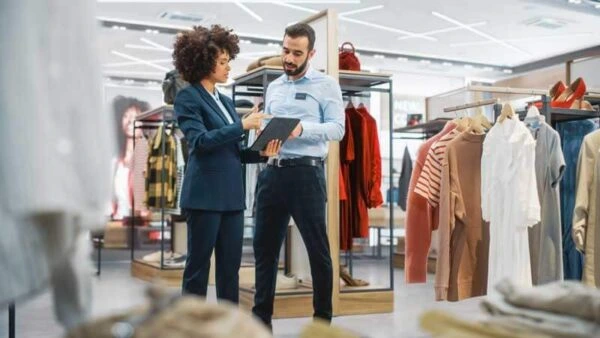 Retail store managers reviewing inventory for Al Saqib Recruitment Agency