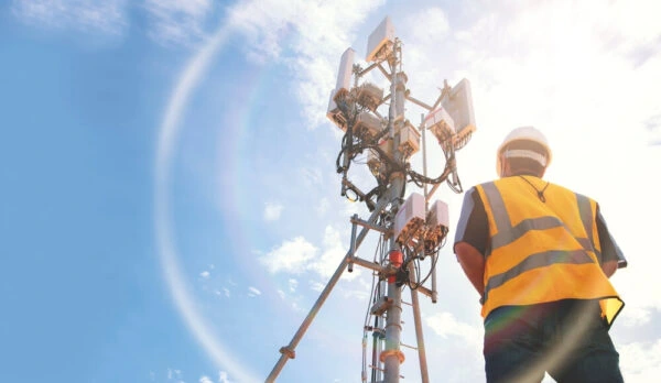 Telecom technician inspecting a mobile communication tower for Al Saqib Recruitment Agency